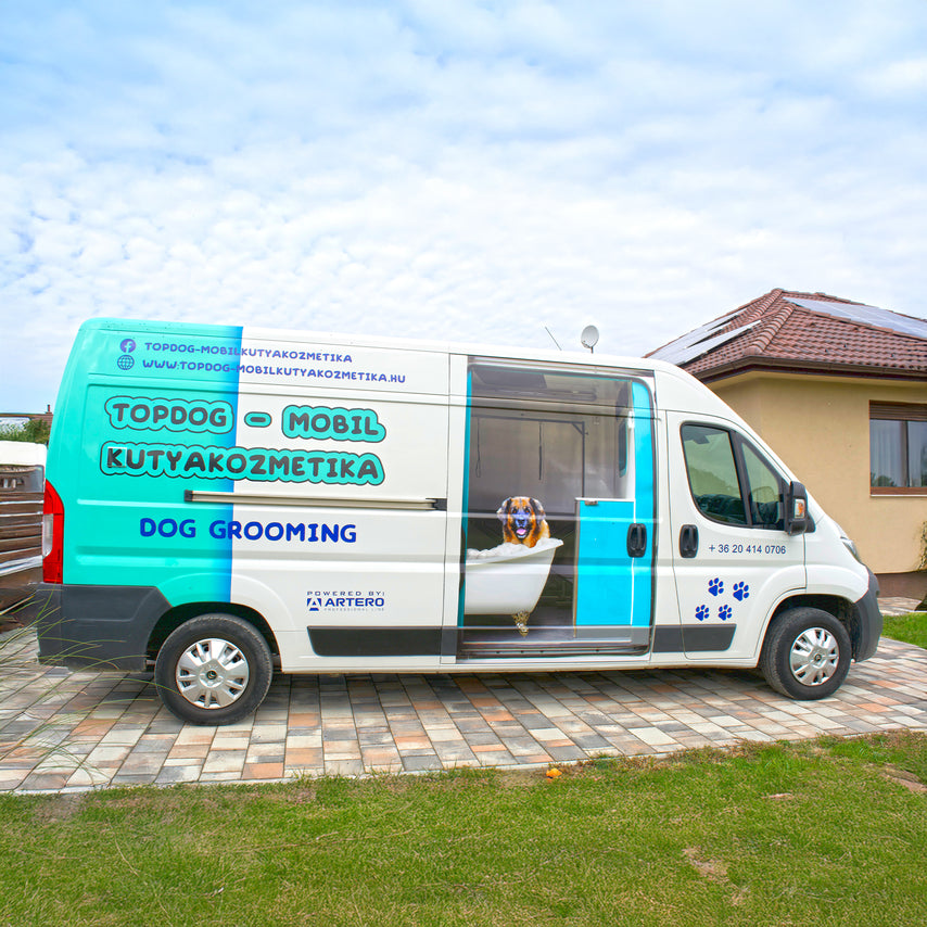 mobile dog grooming van exterior parked at customer location