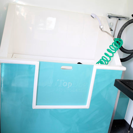 mobile dog bath washing station with dryer inside grooming van