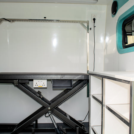 mobile dog grooming van interior with water tank grooming table and bath